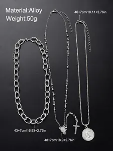 Set de collares plateados con colgantes de cruz y moneda, largos de 43cm a 48cm