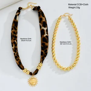 Ensemble de colliers bohèmes avec chaîne léopard et pendentif soleil doré