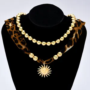 Ensemble collier chaîne en tissu léopard et pendentif soleil doré tendance femme