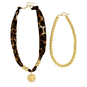 Ensemble collier en tissu imprimé léopard et pendentif soleil doré bohème