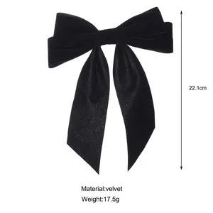 Detailed specs of black velvet bow hair clip with ribbons, 22.1cm length and 17.5g weight