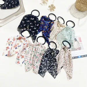 Set of 8 floral chiffon scrunchies with long bows in various elegant patterns