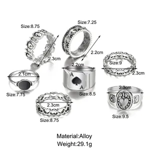 Detailed size guide for 7-piece vintage silver spade heart ring set in alloy