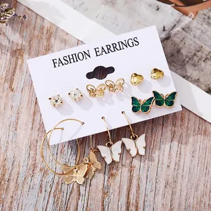 6-pair set of gold butterfly and crystal earrings on a display card for women