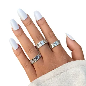 Retro silver wide band ring set with engraved flower and butterfly patterns