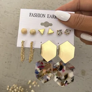 Five-pair vintage gold earring set with acrylic pendants, pearls, and rhinestones