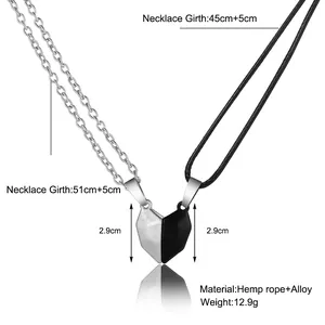 Detail of magnetic heart pendants for couples showing 45cm+5cm cord and metal chains