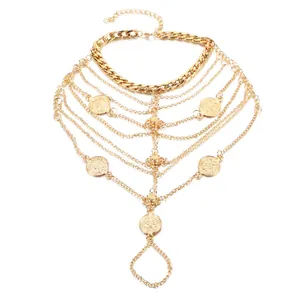 Bracelet de cheville vintage doré multicouche avec pièces et design bohème à franges