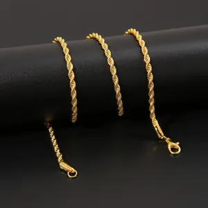 Close-up of a 3mm golden twist rope chain with a lobster clasp on a dark background