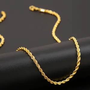 Macro detail of 3mm gold twisted rope chain showing intricate spiral link craftsmanship