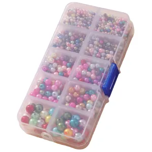 Kit de bijoux DIY avec perles colorées dans une boîte de rangement transparente à 10 cases