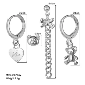 Détails du lot de boucles d'oreilles argentées avec cerise, ours, cœur et nœud