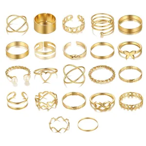 22-piece gold butterfly and heart knuckle ring set with pearls and wave designs