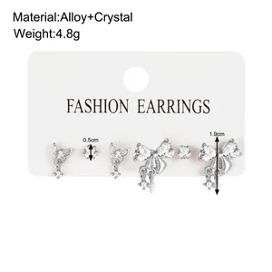 Assortiment de boucles d'oreilles étoile et nœud en argent avec cristaux de zircon
