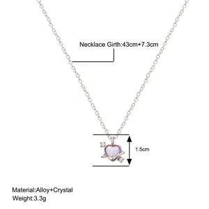 Detail showing dimension and size of the heart planet pendant necklace with silver chain