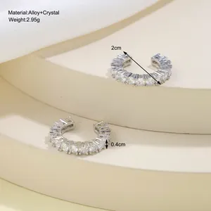 Silver alloy C-shaped ear cuffs with sparkling crystals and size measurements