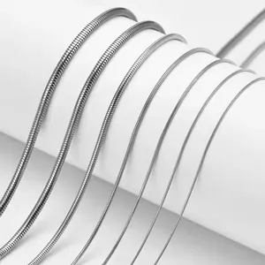 Detail showing seven different thicknesses of silver stainless steel snake bone chains