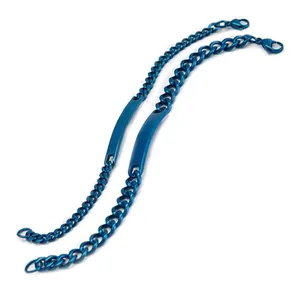 Detail view of blue plated stainless steel couple bracelets with polished curved ID plates