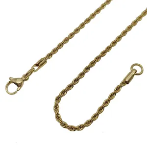 Macro detail of golden rope chain showing spiral texture and lobster clasp closure