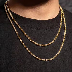 Detail of layered gold rope chains showing the twisted texture and polished metallic shine