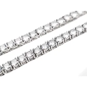 Macro view of stainless steel tennis bracelet with 4-prong set cubic zirconia stones