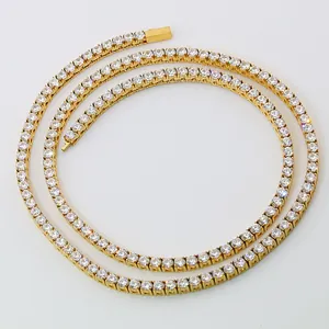 Macro shot of gold-plated stainless steel tennis chain with shimmering 3mm round cubic zirconia