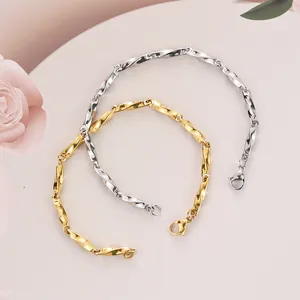 Mobius twisted chain bracelet in gold and silver finish with lobster clasp closure