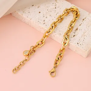 Detail of 18K gold plated chain bracelet with lobster clasp and pave waterdrop pendant