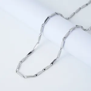 Polished silver stainless steel bamboo chain necklace detail with reflective metal links