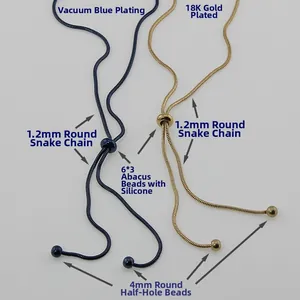 Adjustable 18K gold and blue stainless steel snake chain necklace with slider bead