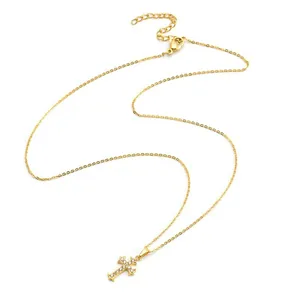 Gold plated stainless steel cross necklace with sparkling cubic zirconia on fine O-chain