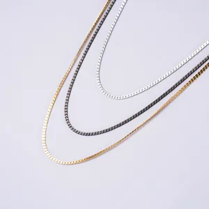 Flache S-förmige Schlangenknochenketten in Gold, Schwarz und Silber für Damen