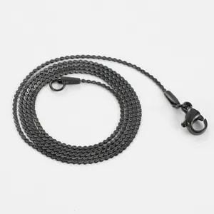 Close-up of matte black 304 stainless steel S-shaped twisted chain with lobster clasp