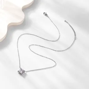 Macro detail of square purple zircon pendant necklace with adjustable silver chain
