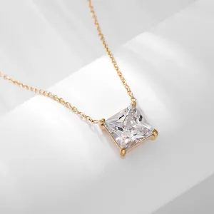 Close-up of square cut zircon pendant necklace in gold-plated stainless steel