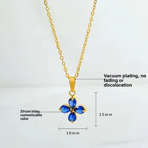 Detail view of 13x10mm blue zircon clover pendant on gold plated stainless steel chain