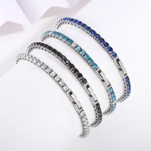 Detailed macro view of 3mm tennis bracelets in white, black, and blue cubic zirconia stones
