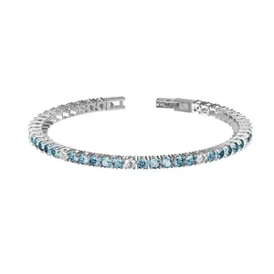 Detail of blue and white cubic zirconia tennis bracelet with stainless steel clasp