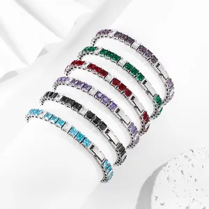Close-up of multicolored tennis bracelets with square-cut cubic zirconia and fold-over clasp