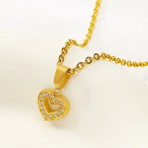 Detail of gold-plated square heart necklace with cubic zirconia pavé and O-chain link