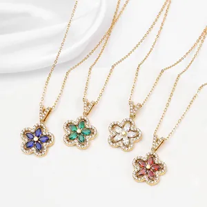 Elegant gold necklace set with colorful crystal petals and micro-paved diamond edges