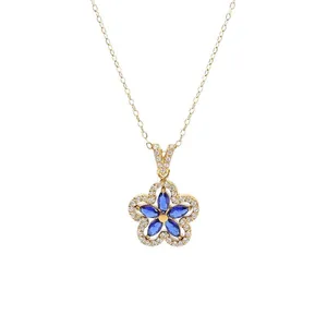 Elegant five-petal flower pendant necklace with blue stones and gold-plated chain