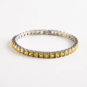 Close-up of square cut yellow cubic zirconia tennis bracelet with silver clasp