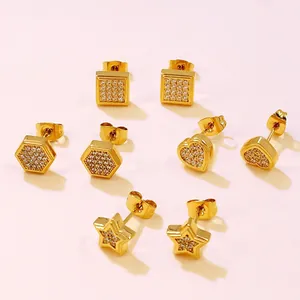 Macro shot of geometric gold earrings set with pave cubic zirconia and butterfly backs
