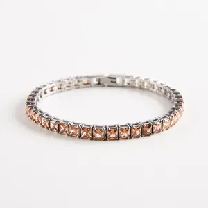 Square-cut champagne zircon tennis bracelet with silver-plated chain and fold-over clasp