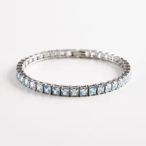 Silver tennis bracelet with princess cut light blue zircon stones in a square setting
