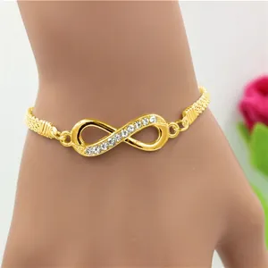 Pulsera de infinito dorada con cristales brillantes y cadena tejida para mujer