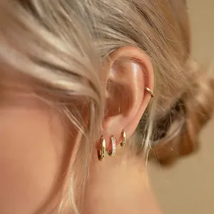 Minimalist gold brass C-shaped hoop earrings and ear cuff set with sparkling zircon