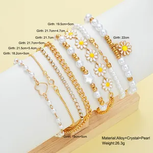Coffret de 10 bracelets perles dorées avec cœurs et marguerites bohèmes
