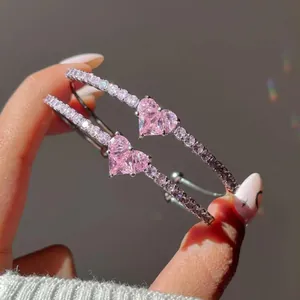 Luxury silver bracelet with large pink heart-shaped zircon and pave set pink crystals